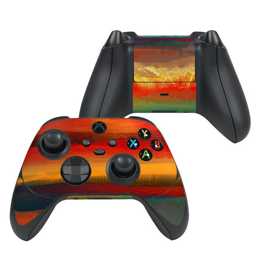 Xbox controller skin with orange-to-red desert sunset graphic and colored action buttons