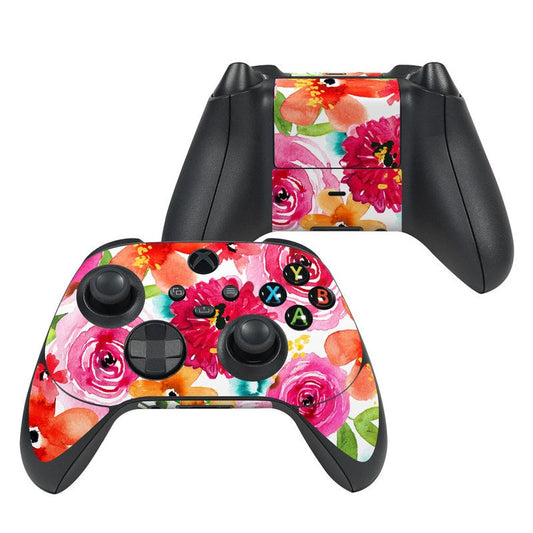 Floral pop Xbox controller skin with colorful pink and orange flower pattern.