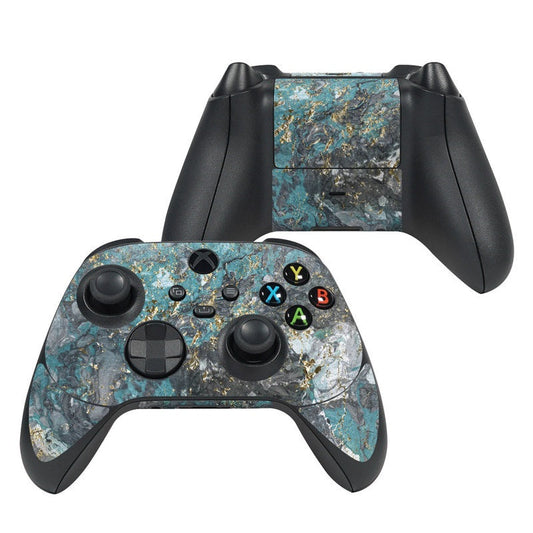 Xbox controller skin with teal and gold marble pattern, cutouts for buttons and sticks