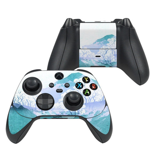 Xbox controller skin with blue mountain and tree pattern, printed buttons and icons.
