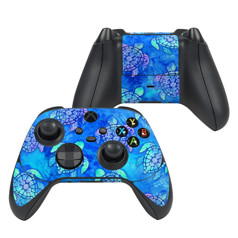 Xbox Series X controller skin with blue sea turtle and floral pattern, black buttons cutouts