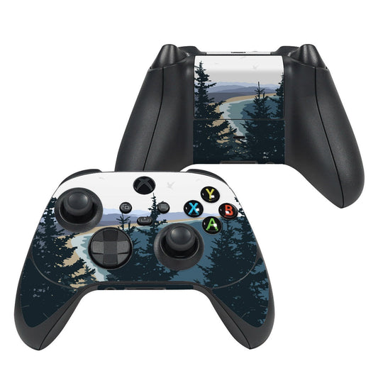 Xbox Series X controller skin with dark forest landscape print over black controller