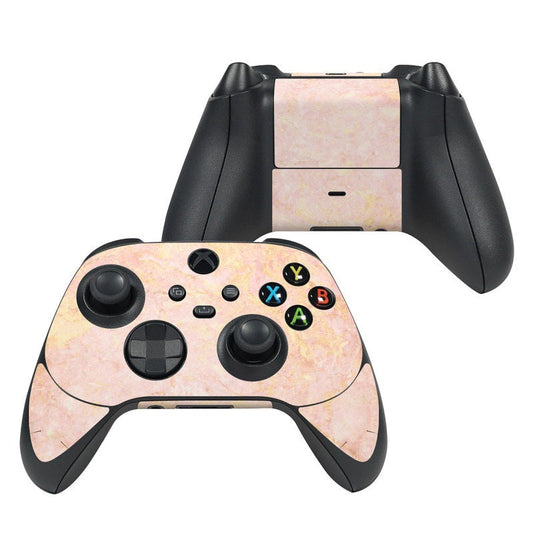Xbox controller skin with rose-gold marble pattern and colored button icons