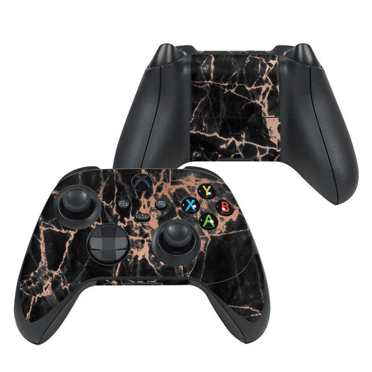 Xbox Series X controller skin with rose quartz marble pattern, black base and pink veining.