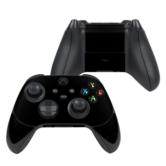 Black Xbox Series X controller skin with thumbstick and button cutouts visible