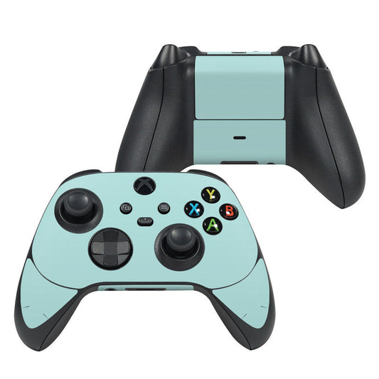 Mint teal Xbox Series X controller skin with black thumbsticks and button icon layout