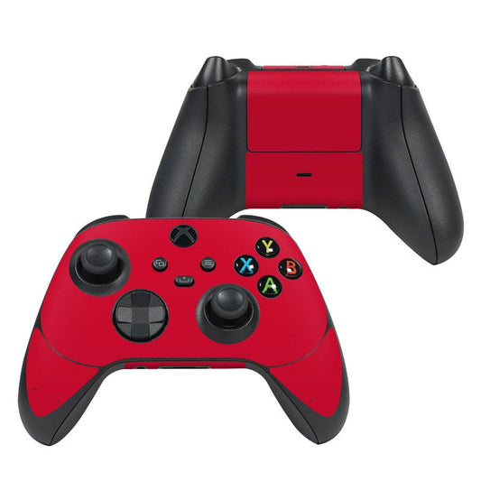 Red Xbox controller skin with black grips and colorful button decals