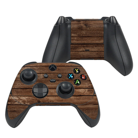 Xbox Series X controller skin with dark wood striped panels and colored button decals