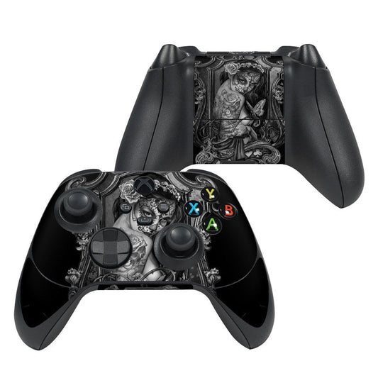 Black Xbox Series X controller skin with widow illustration and colored ABXY buttons