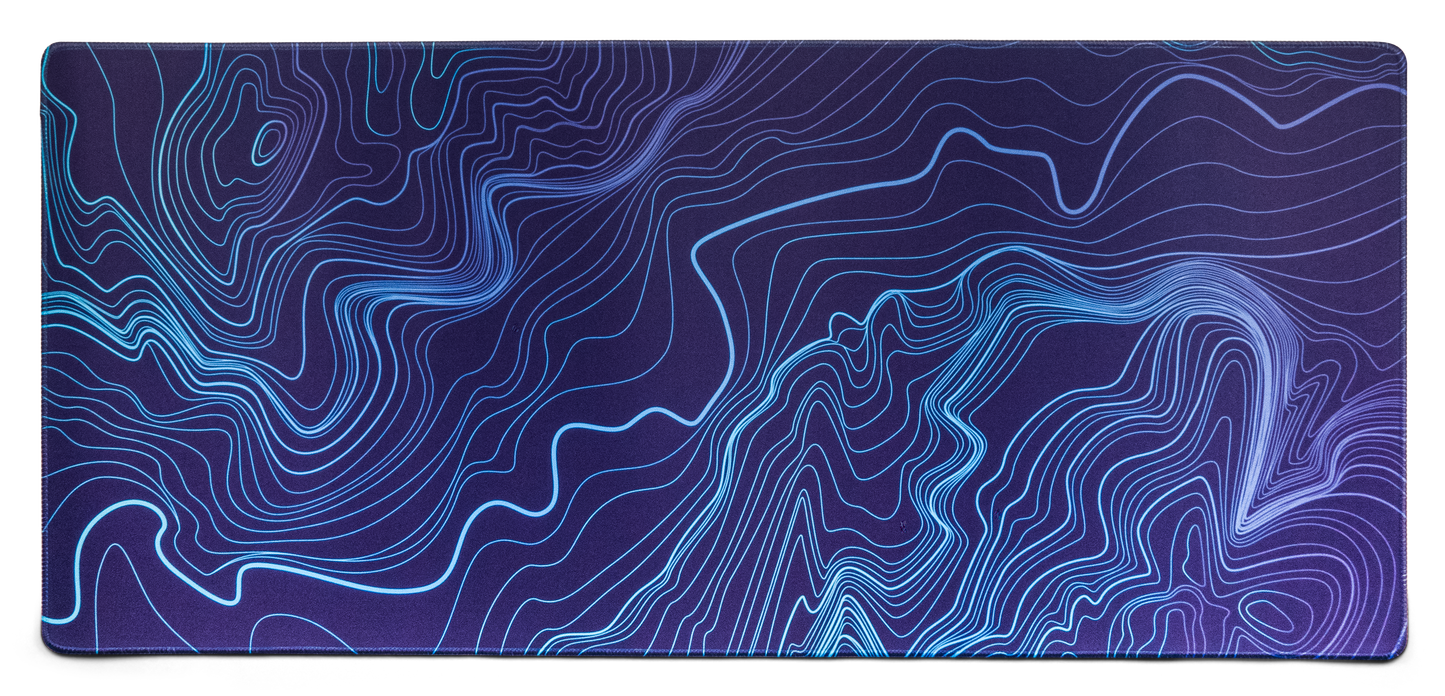 Purple-blue desk mat with blue topographic contour line pattern and rounded edges